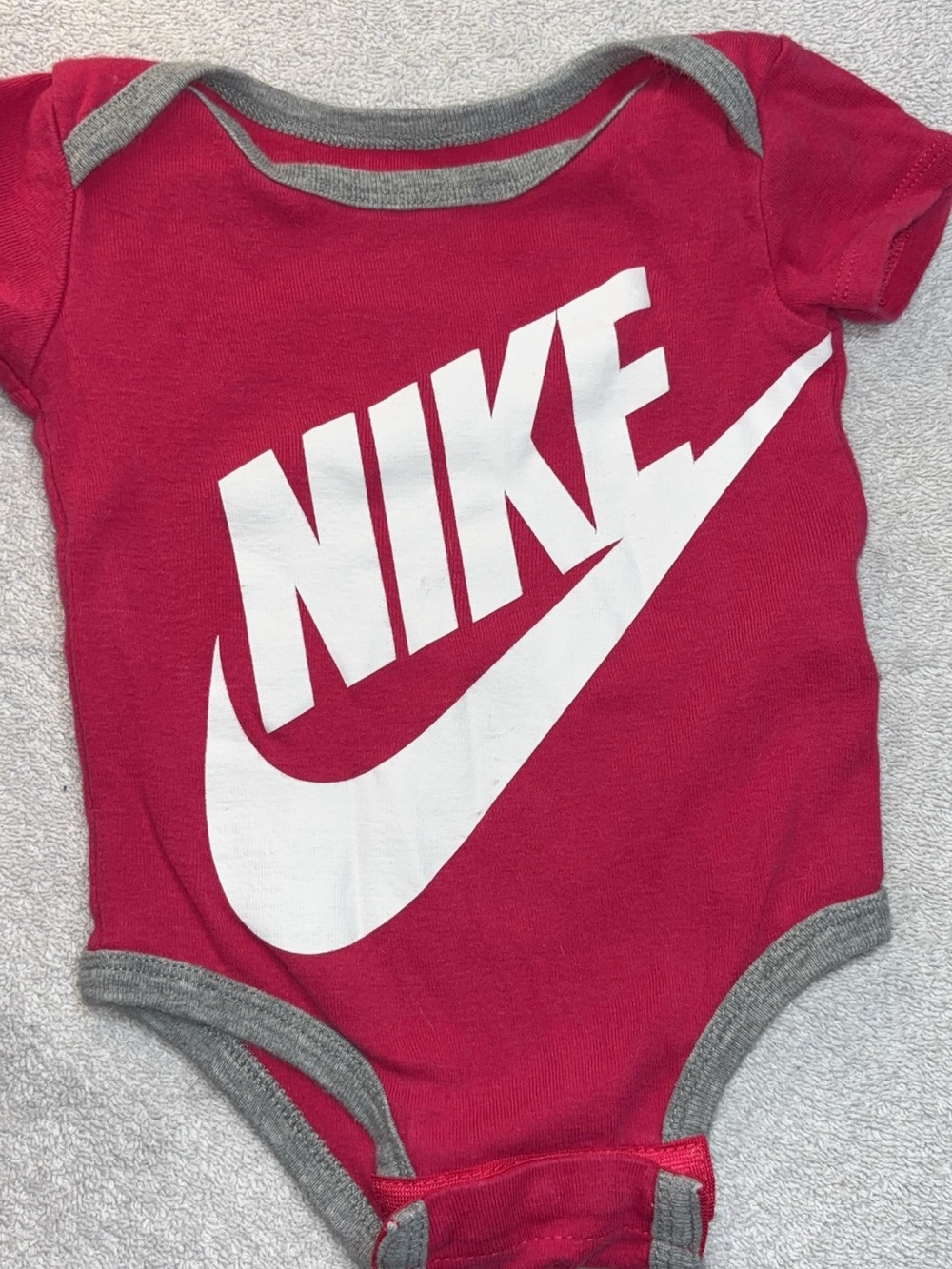 Nike Baby One-Piece Bodysuit in Red with White Logo